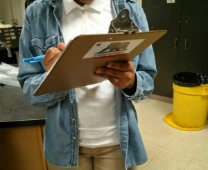 student with clipboard